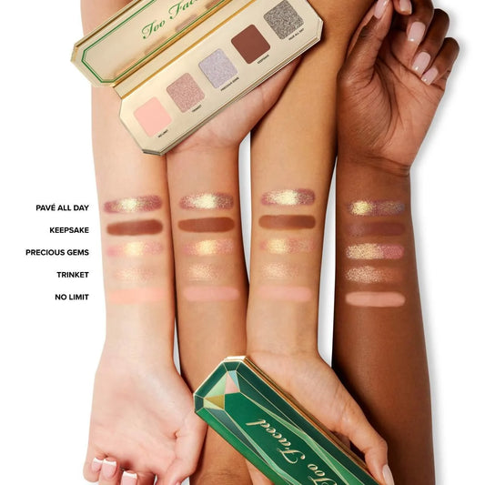 Too Faced Precious Gems Eyeshadow Palette with shimmering jewel-toned shades and a sleek compact design.