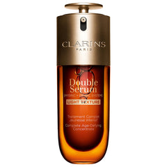 Clarins Double Serum Light Texture 50ml bottle with pump, new in box, displaying sleek packaging and product details.