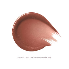 Rare Beauty Positive Light Luminizing Lip Gloss in various shades, new on box, featuring a shiny, smooth lip gloss tube.
