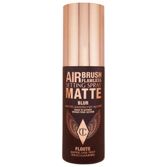 Charlotte Tilbury Airbrush Flawless Matte setting spray in 34ml bottle, featuring a sleek design for matte, waterproof makeup setting