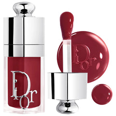 Dior Lip Glow Oil hydrating high-shine gloss in three finishes, new in box, with a sleek tube and applicator visible.