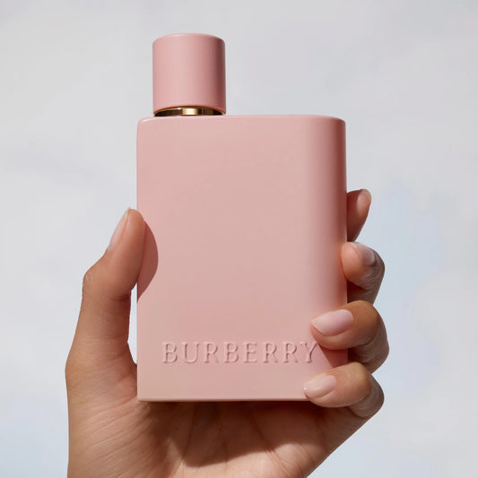 Burberry Her Parfum 100ml bottle, elegant glass container with gold accents, displayed in a beauty product image.