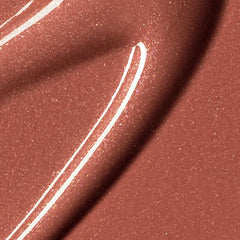 Rare Beauty Positive Light Luminizing Lip Gloss in various shades, featuring a sleek, glossy finish and vibrant color options.