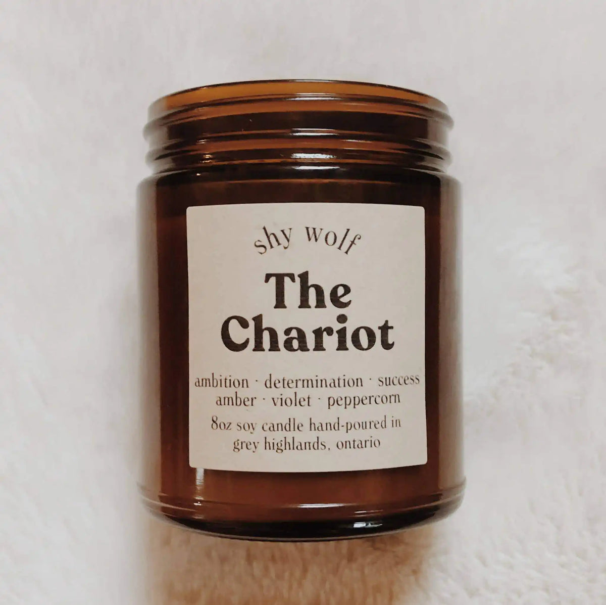 Shy Wolf Candles The Chariot soy candle with santal and amber scent, designed for home ambiance and decorative display.