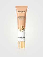 Guerlain Terracotta Joli Teint tinted moisturizer in shade NIB, providing a natural, glowing finish with light protection.