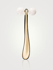 Clarins Precious Le Roll-On beauty product with a sleek silver rollerball applicator for targeted skincare.