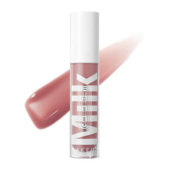 Milk Makeup Odyssey Hydrating Lip Oil Gloss in various shades, featuring a non-sticky, glossy finish and nourishing formula.